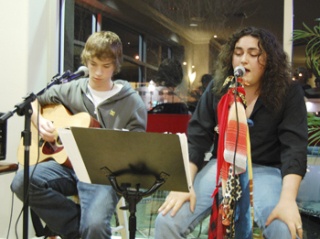 Branden Balles on guitar  and Alex Durate from the Blue Armada Band preformed at Cutters Point April 6 before a large crowd of friends and fans.