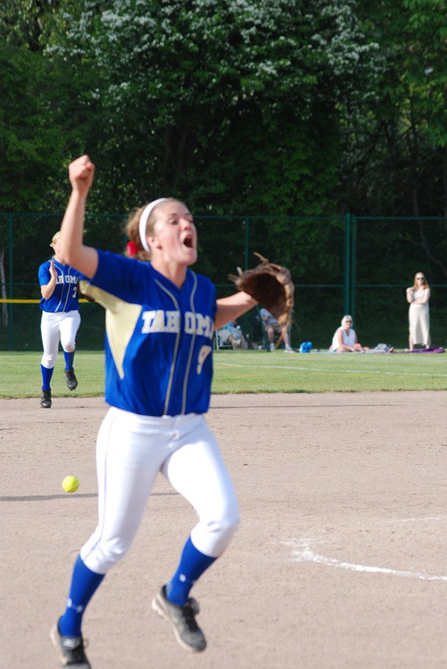 Courtney Cloud celebrates a win over Todd Beamer in the South Puget Sound league semi-final game May 10.