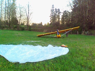 The pilot of a small hand-made plane found a safe spot to land in Black Diamond after deploying a parachute. The plane had flown from Enumclaw when a bolt came loose.