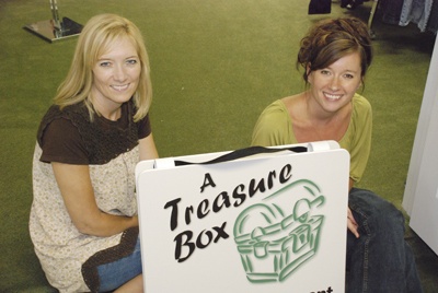 A Treasure Box owners Karen Moore and Tina Maletich have been putting the finishing touches on their new consignment shop in Maple Valley.