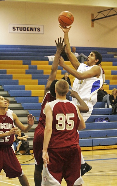 Tahoma's Christian Behrens lays it up for two against Cascade