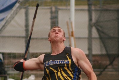 Derek Eager wins the javelin with this throw reaching 211 feet
