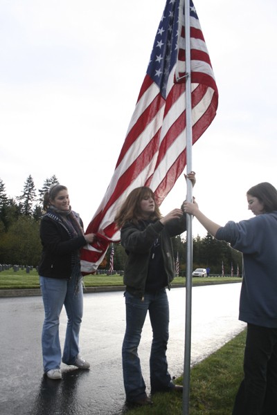 Students from Tahoma Junior High raised flags at the Tahoma National Cemetery Nov. 10 in preparation for Veterans Day.