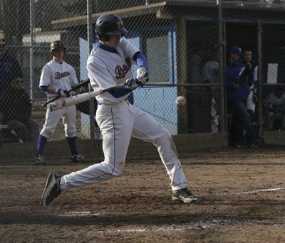 Tahoma junior Troy LaBrie swings at the ball during a game against Mt. Rainier March 23.