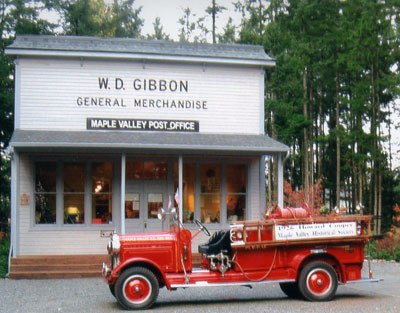 The restored 1926 Howard Cooper fire engine sits outside the museum in front of the original Gibbon/Mezzavilla grocery store moved to this location behind the Maple Valley Community Center.