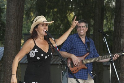 Kellee Bradley and Gary Sparling preform at the Music in the Park event Thursday at Lake Wilderness.