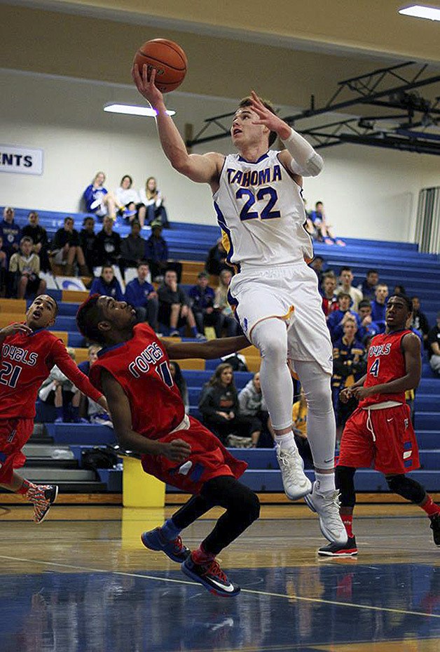 Tahoma’s Coleman Wooten goes up for the layup against Kent-Meridian in a 62-56 win Dec. 7 at home.