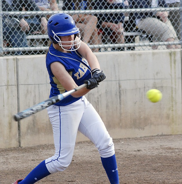 Tahoma’s Bre West loads up to smack a base hit in the SPSL championship game against Emerald Ridge May 10 at Kent Service Club Ballfields. Tahoma moves on to districts Friday.