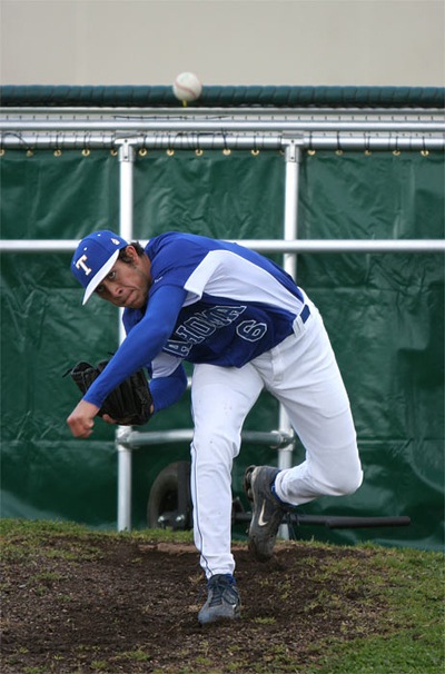 Tahoma High grad Kirk Wetmore warms up before a game against Auburn in March 2007.
