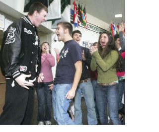 Karsten Wise (left) and Alexander Lee lead their classmates in celebration of winning a friendly interclass competition in Kentwood High School’s recent food drive benefitting food banks. More photos are in the Gallery and Photo Reprint section of the Reporter’s online edition.