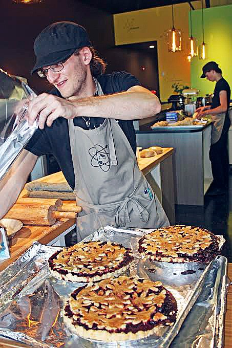 Matt D’Alessio covers freshly baked pies at the Pie Lab