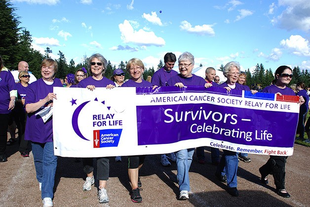 Cancer survivors led off the Covington-Maple Valley-Black Diamond Relay for Life event June 1 at Cedar Heights Middle School in Covington. The overnight event highlights the constant battle of those with cancer. There were 43 teams and 400 participants with more than $67