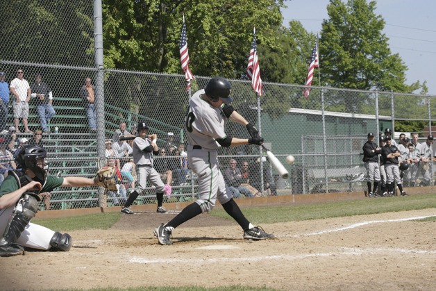 Kentwood's Skyler Genger gets his bat on the ball in the win over Edmonds-Woodway Saturday at Kent Memorial Park.
