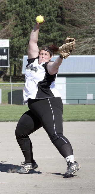 Kentwood senior Kayla Evans pitches in 4-3 win over Auburn Riverside earlier this week. Evans tossed a two-hit complete game with five strikeouts.