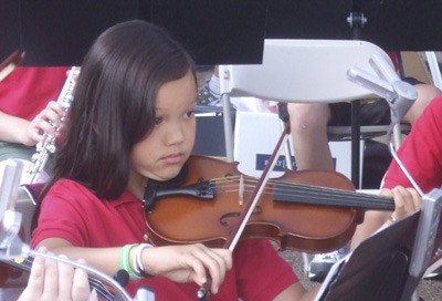 Abigail Weros plays violin for the Maple Valley Symphony Orchestra.