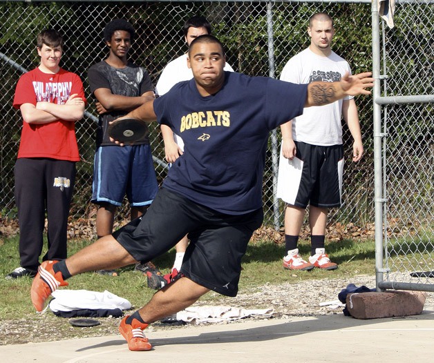 Dallas Hayes practices his throwing technique at practice on April 11. Last year Hayes placed sixth at the state meet. This year he has already shattered his previous personal best of 141 feet.
