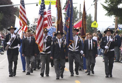The Black Diamond Labor Day parade began with the presentation of the flags.