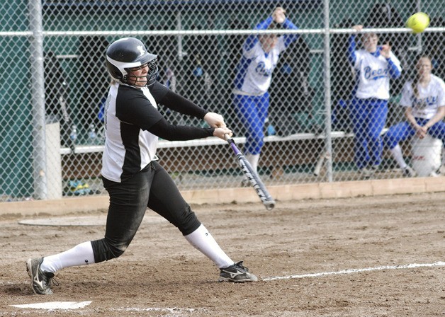 Kentwood’s Bailey Marshall puts the bat on the ball in a 7-1 win over Tahoma on Monday. Marshall was 2-for-4 in the game with a double and an RBI.