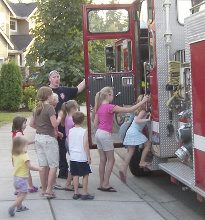 Kids enjoyed exploring the Maple Valley fire department engine Aug. 4 during National Night Out.