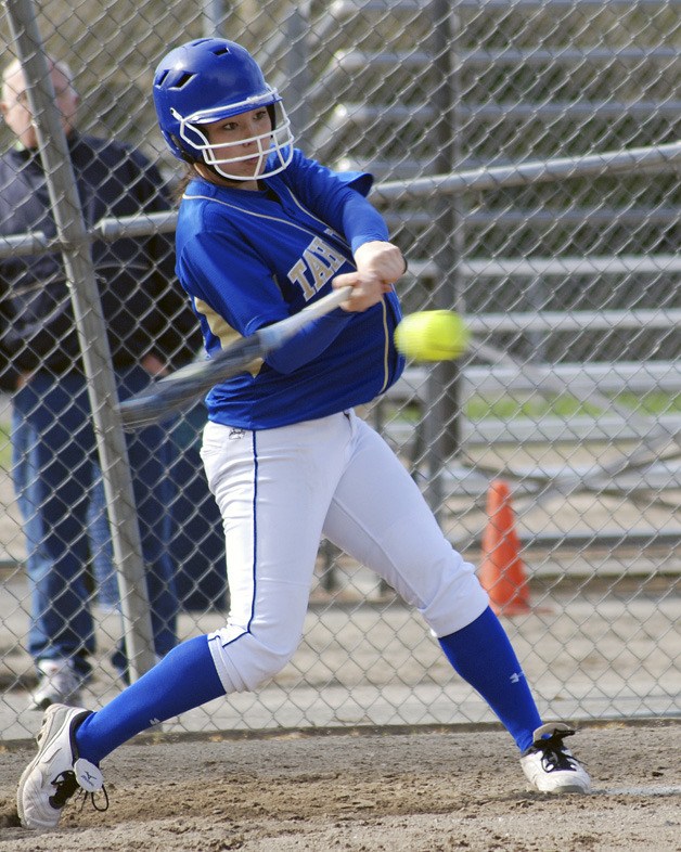 Tahoma’s Morgan Engelhardt is about to hit a two-run triple in a 13-4 win over Auburn Riverside on April 13.