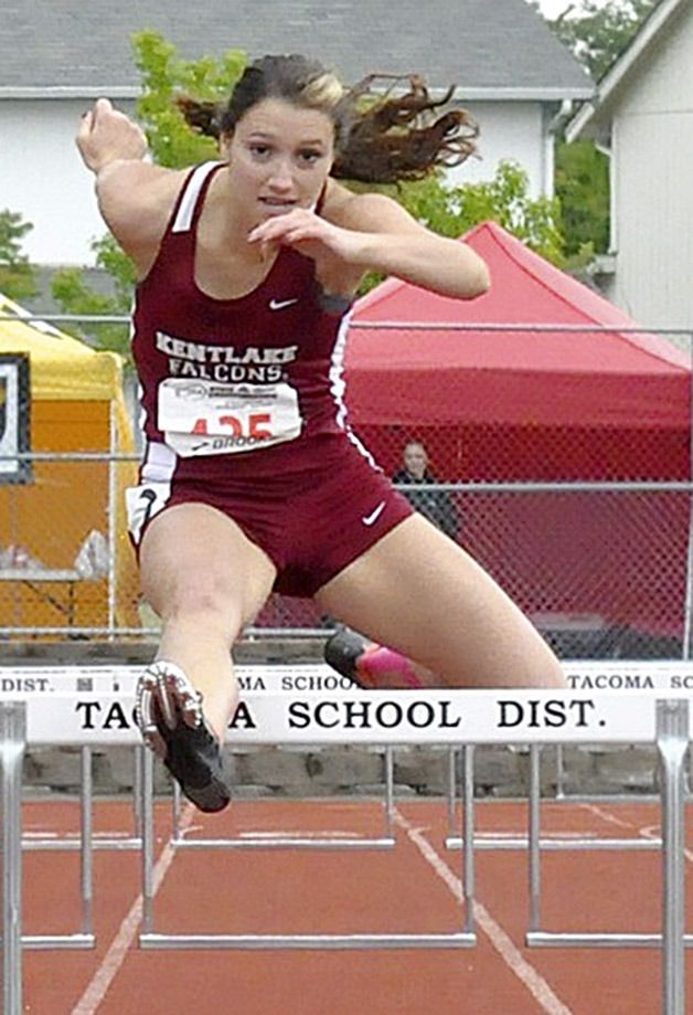 Kentlake’s Tori Lanza clears the final hurdle on her way to a bronze medal in the 300 meter race at state.