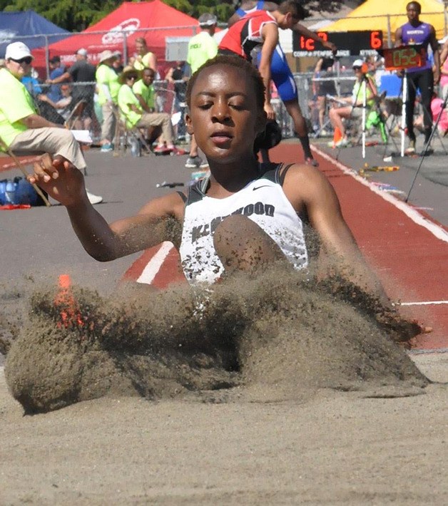 Kentwood’s Brittany Woke won a gold medal in the long jump at the 4A state track and field meet Saturday at Mount Tahoma High School. She also took the bronze in the triple jump.