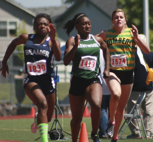 Kentwood senior Mykala Benjamin sprints to the finish line in the 100 meter race at the WIAA Track and Field State Championship at Mt. Tahoma in Tacoma on Friday