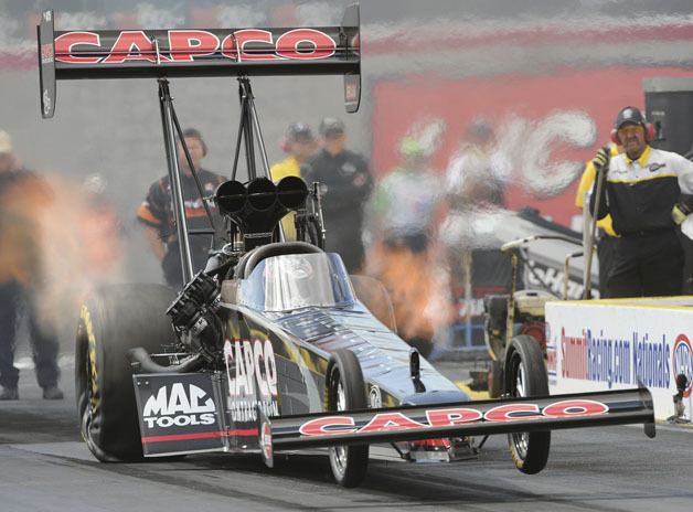 Steve Torrence launches the Capco top fuel dragster from the start line at a race earlier this season. The 29-year-old driver has risen through the ranks and started his own team