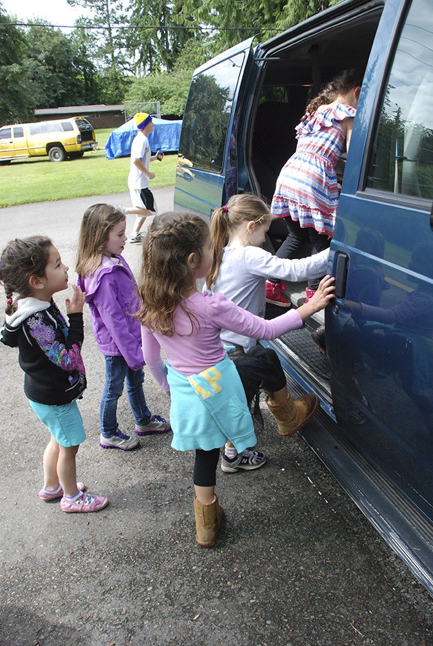 Campers at Camp Berachah check out a van donated to the camp by King County.
