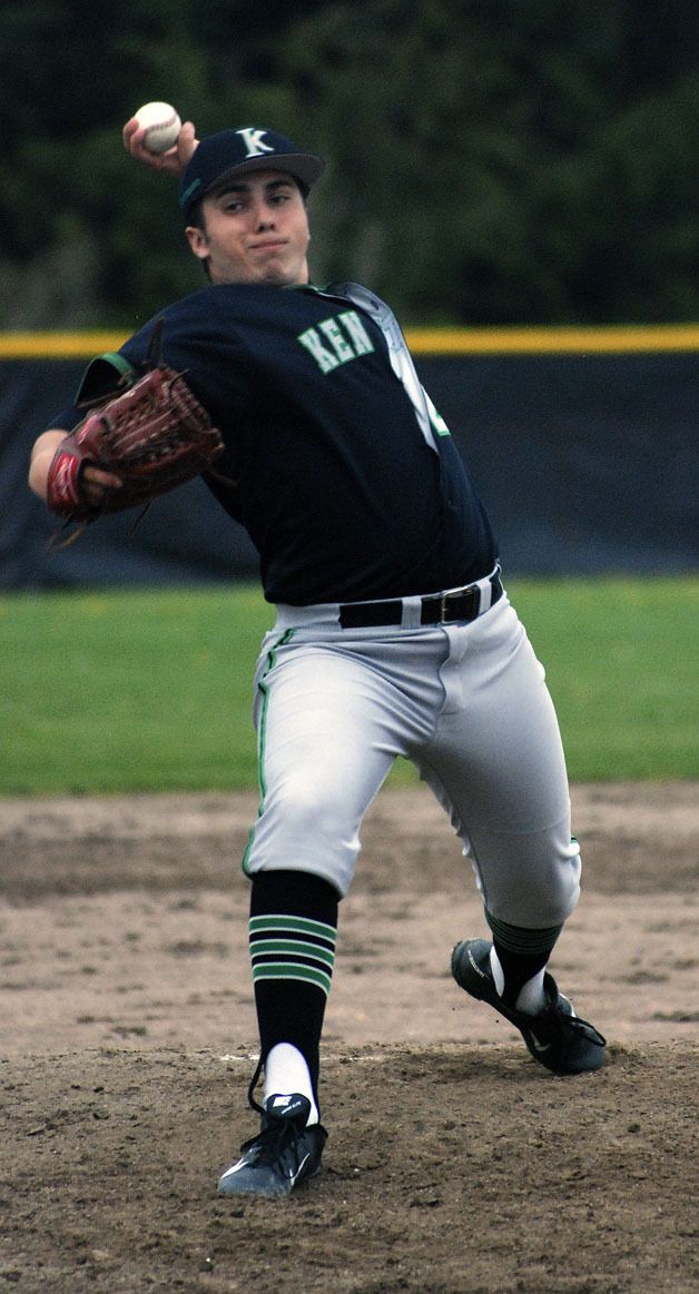 Kentwood’s Jake Roes pitches in relief in the sixth inning against Auburn Tuesday afternoon in a home game.