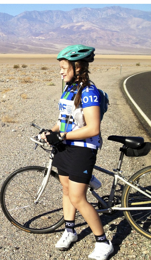 Tahoma High sophomore Elizabeth Zosel takes a break during the 80 mile bike ride through Death Valley as a part of the Juvenile Diabetes Research Foundation’s Ride for a Cure fundraiser.