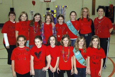 Girl Scouts Troop 42505  hosted a GO RED event Feb. 4 at Lake Wilderness Elementary School. Pictured front left to right are Samantha Simmelink
