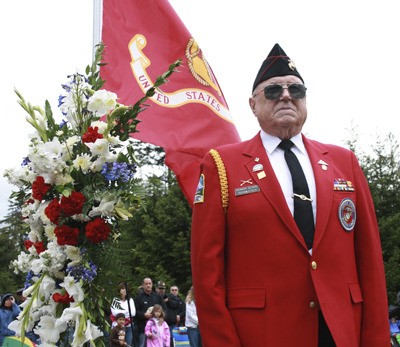 Al Rasmussen performed the laying of wreaths for the U.S. Marines Monday