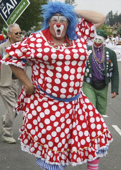 Seafair clowns entertained the crowd at the Covington Day parade Saturday.