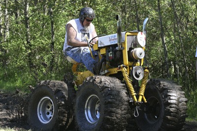 Clint Willaford powers through in the lawn mower race Saturday at Lake Wilderness Park during Maple Valley Days.