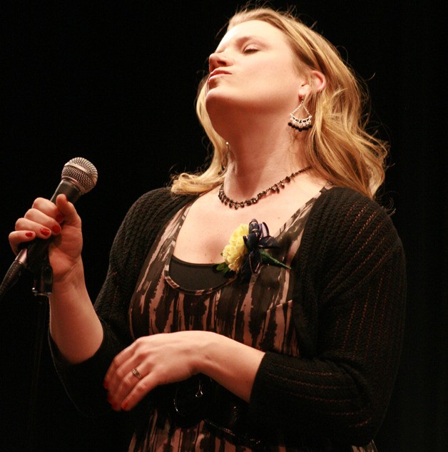 Jackie Rupert sings at the Tahoma Faculty Concert Friday at the Tahoma Middle School.