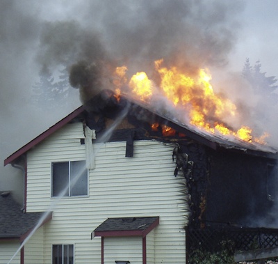 A house fire Maple Valley Monday morning injured a man and a firefighter.