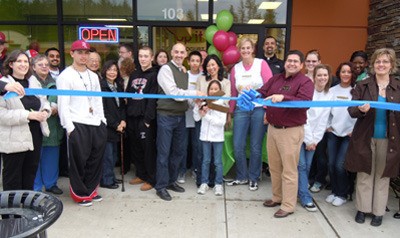 The Covington Chamber of Commerce and community welcomed owners Karen Chin-Reasoner and Kurt Reasoner and their new business with a ribbon cutting ceremony at their Grand Opening April 7