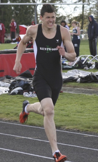 Kentwood's Devin St. Clair sprints to a first place finish in the 400 meter race last week.