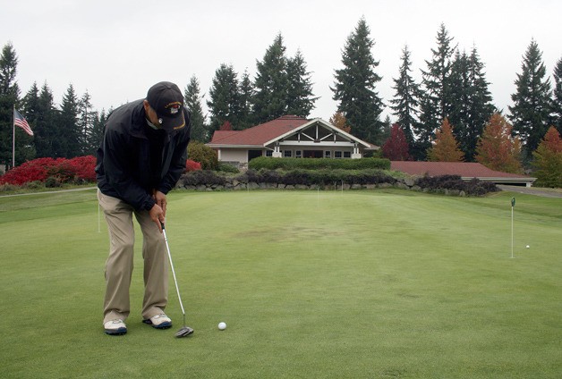 Bryan Takeuchi of Fairwood gets some putting practice in Oct. 10 at the Elk Run Golf Course. The course and restaurant are scheduled to close permanently Sunday