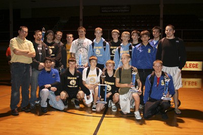 The Tahoma wrestling team took third at the Tri-State Tournament three won championships in their weight class. Pictured are back Row: coach Gene Hopkins
