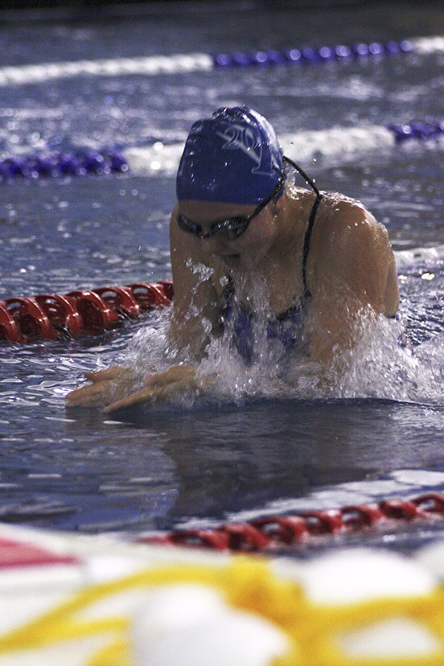 Brooke Bailey swims the breaststroke leg of the 200 medley relay against Kentlake on Sept. 19. Kentlake won the meet 98-87.