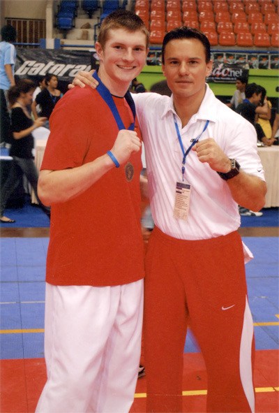 Tyler Phippen and Pan Am Junior championship coach Juan Moreno.