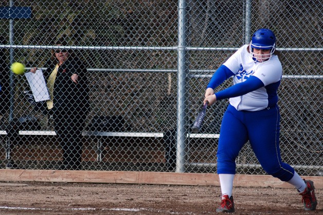 Tahoma's Jordan Walley smacks a double in her second at-bat in a 10-0 win over Mount Rainier on March 23. Walley also got the victory in the circle.