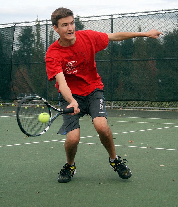 Shaun Fisher volleys with a partner on Oct. 27 prior to the district tournament scheduled for Oct. 31 in Tumwater.