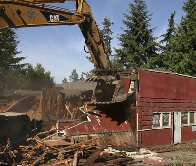 The former Wilderness Tavern came down today after standing at the corner of Witte Road and Maple Valley-Black Diamond Road since the early 1930s.