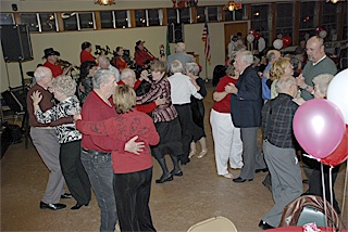 Couples enjoy dancing at the community center Feb. 14 during the Senior Sweetheart Valentine’s Day Dinner and Dance.