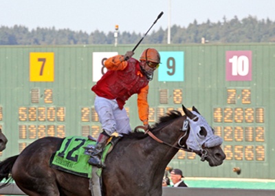 Gallyn Mitchell wins the 2009 edition of the Longacres Mile aboard Assessment.