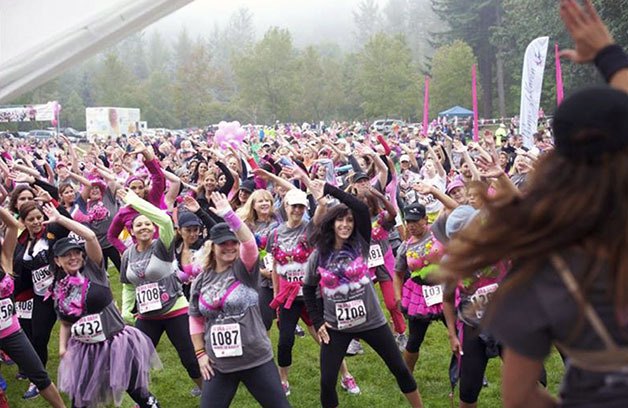Bra Dash 5K participants go through a Zumba routine to warm up at Lake Wilderness Park before the event to benefit Wings of Karen