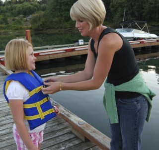 Children should wear life jackets and be supervised by adults when around water.